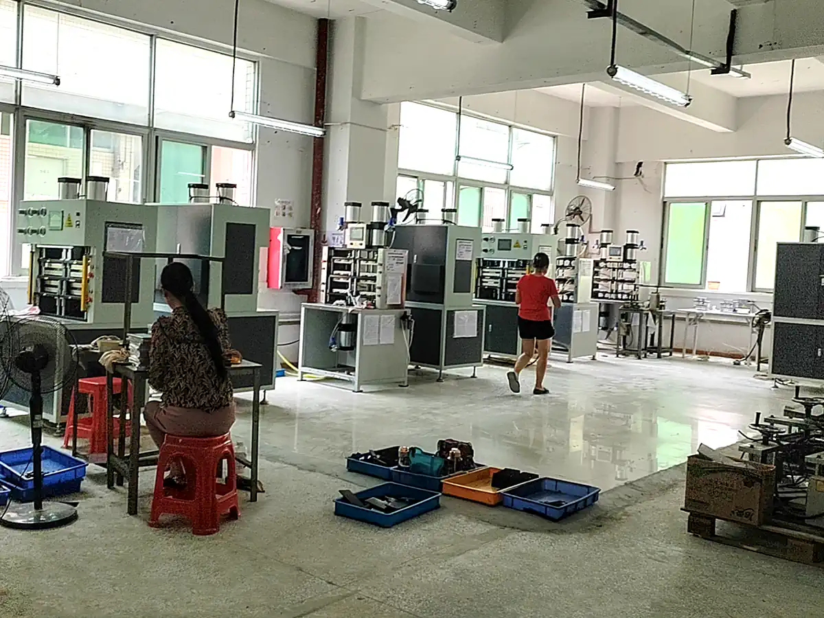 Cold lamination workshop for acetate material assembly in eyewear manufacturing
