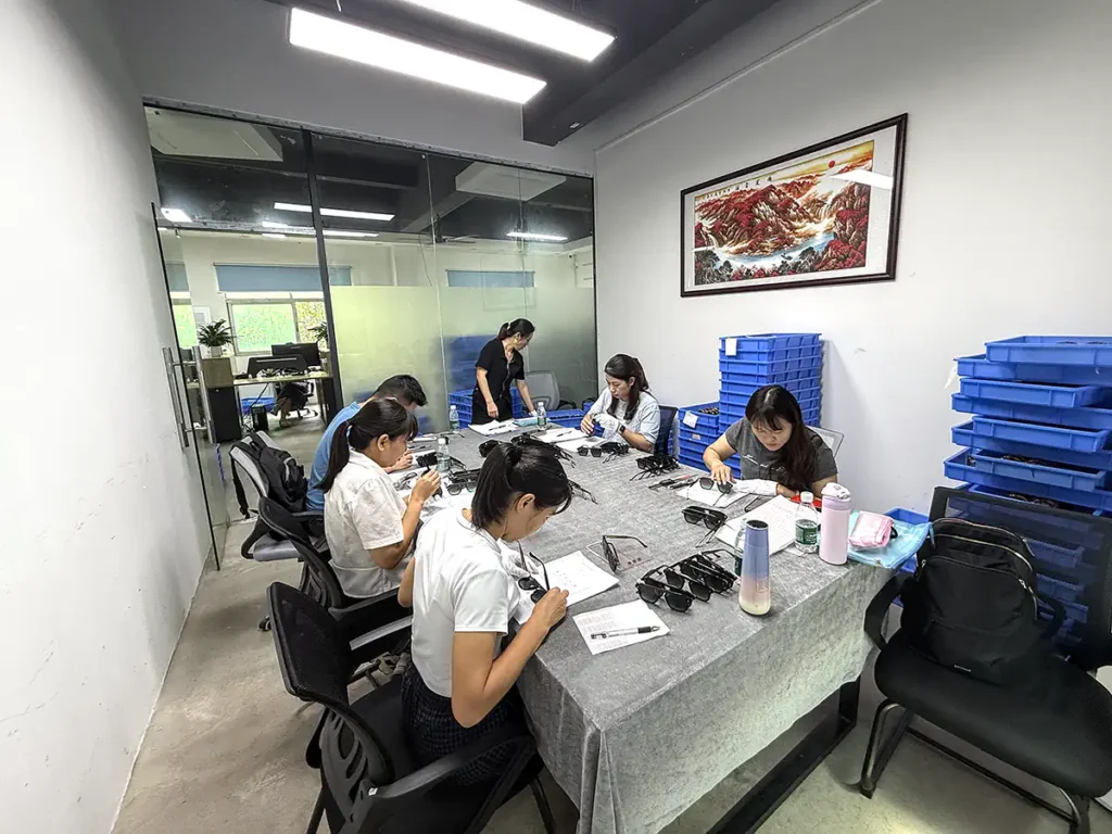 SEESUN team checking batches of eyewear frames during mass production at its eyeglasses factory in China