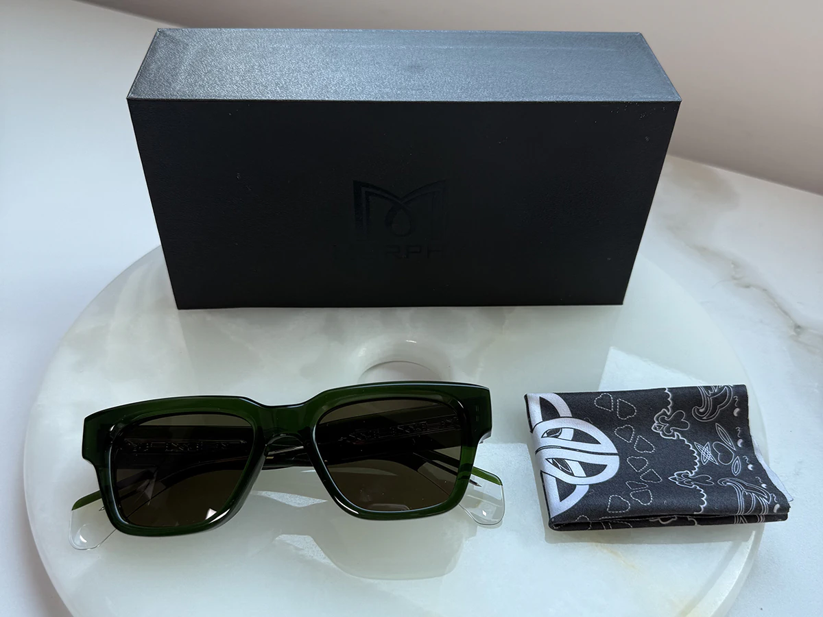 Green private label sunglasses with branded box and cleaning cloth