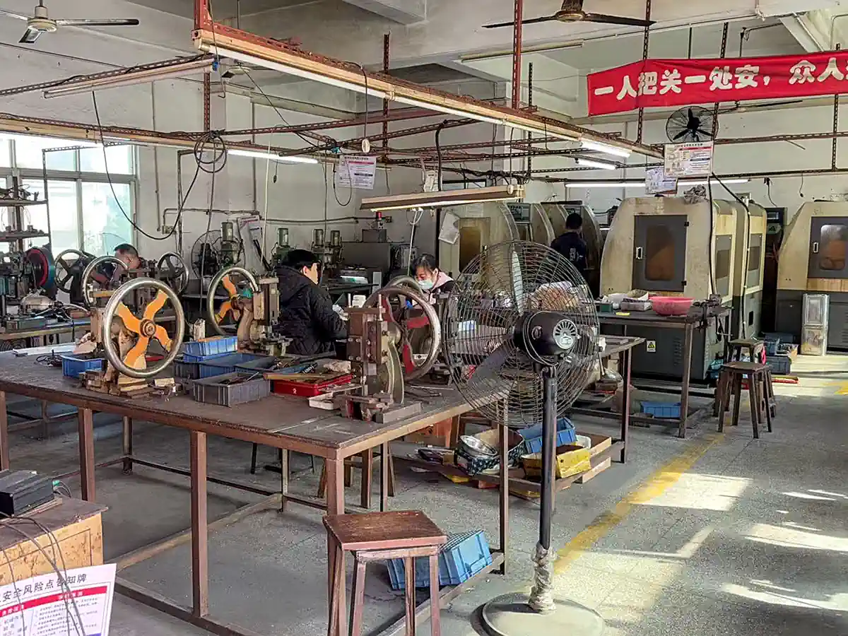 Early SEESUN eyewear manufacturing workshop with workers and production equipment in China