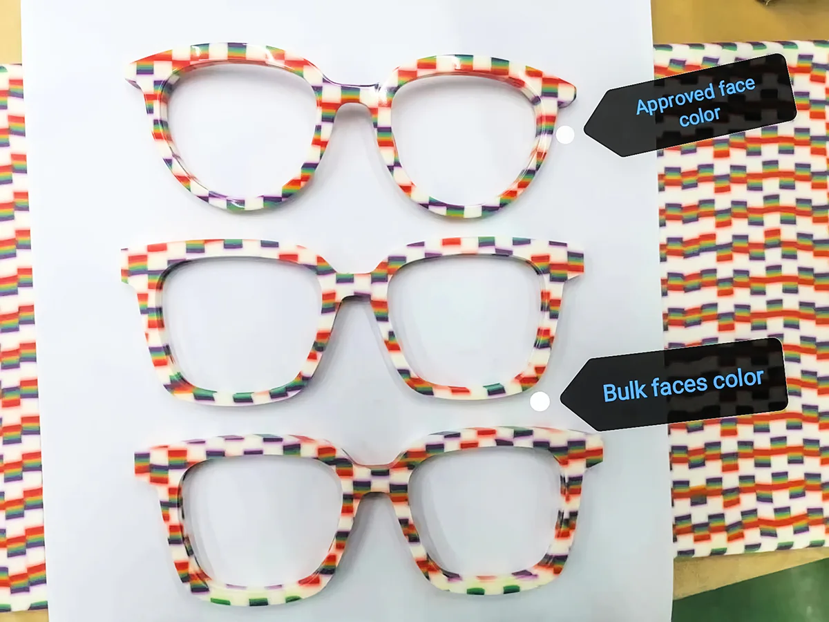 Multicolor acetate frame fronts arranged to compare the approved sample color with bulk production colors