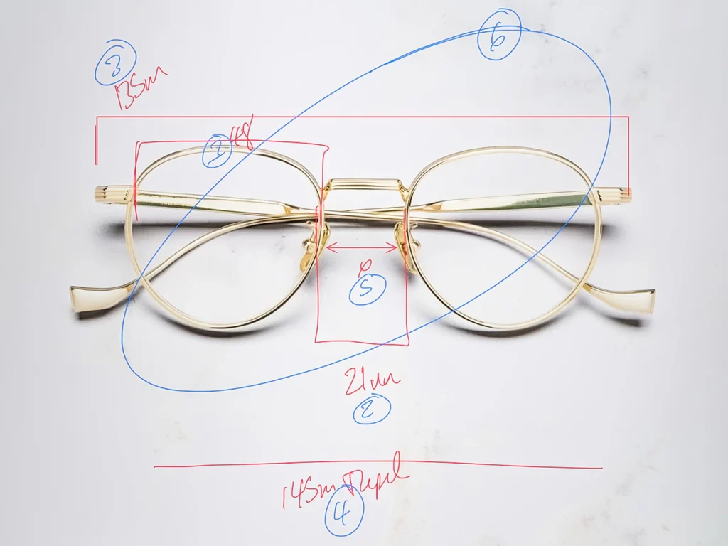 Eyewear sample with handwritten dimension and design review notes