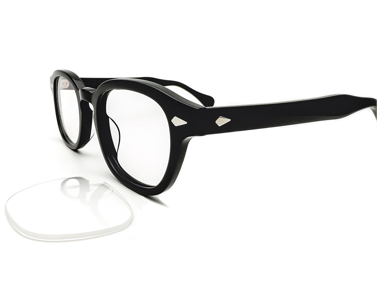 Black optical frame with a separate clear lens positioned for fitting