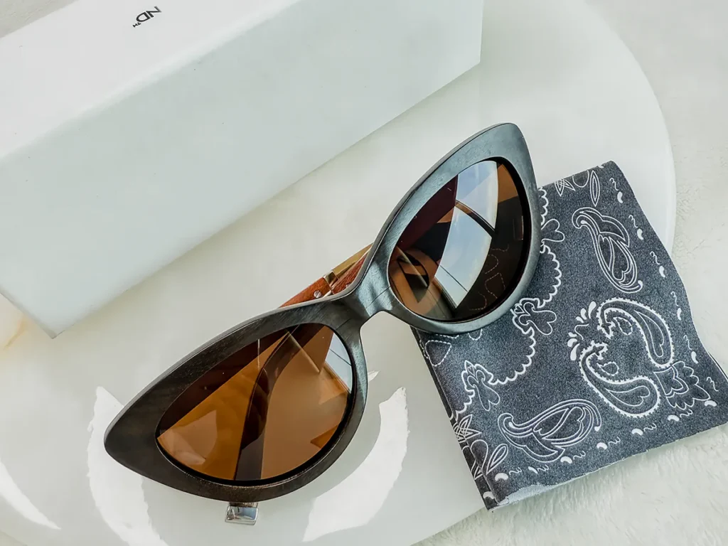 Private label sunglasses displayed with customizable eyewear packaging and a logo placement area for brand presentation